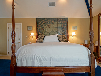 The bed in the Asti is slightly elevated with a step-stool at the foot of the bed. Climb into comfort!